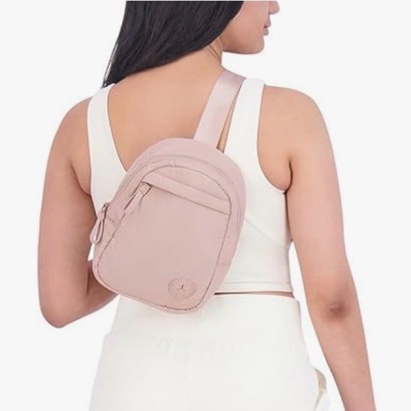 danskin mini backpack Detention 8L trendy style features include a mix of pockets for quick access and secure storage of keys DANSKIN Women's Lowry Crossbody Bag